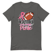 Load image into Gallery viewer, In October we wear pink football Unisex t-shirt
