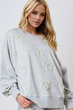 Load image into Gallery viewer, Pearl Bow Round Neck Dropped Shoulder Sweatshirt
