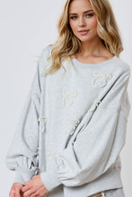 Load image into Gallery viewer, Pearl Bow Round Neck Dropped Shoulder Sweatshirt
