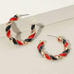 1 blue/white and 
1 red/black earrings